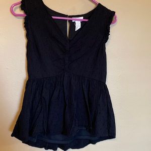 Black sleeveless blouse